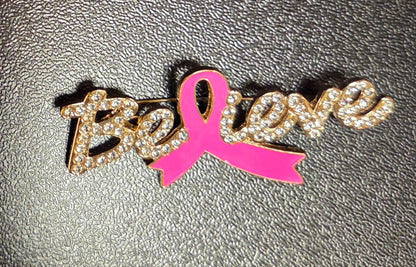 “Believe” Pink Ribbon Crystal Brooch – Sparkle of Strength Edition